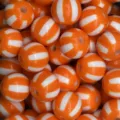 Close up of orange and white striped acrylic round beads for DIY jewelry and phone chains. - Striped Round Bead / 12mm / Orange Red