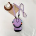 Purple mini crossbody phone bag with vibrant color-block woven handle, stylish casual pouch. - Purple