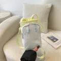 Dopamin Farbblock Handy Umhängetasche, stilvolle kleine Schultertasche für Outdoor-Sport und Alltag. - Gelb