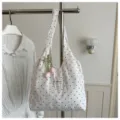 White polka dot canvas tote bag, cute floral charm single shoulder handbag variant. - With Pendant / White