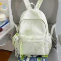 Zaino scolastico casual verde chiaro con stelle e grazioso ciondolo nappa in pizzo. - Con Ornamento / Taglia L / Verde