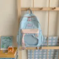 Hellblauer Studentenrucksack mit rosa Akzenten, transparenter Vordertasche und süßen Stern-Zipper. - S / Blau