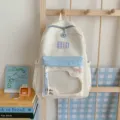 Süßer farbblockierter Studentenrucksack mit transparenter Tasche für Schule und Alltag. - L / Weiß