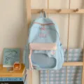 Hellblaue, farbgesperrte Schüler-Rucksack, frischer Stil Freizeit-Schultasche mit transparentem Fach - L / Blau