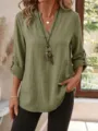 Detail view of the green casual V-neck long sleeve blouse, featuring button rolled sleeves. - S / Tops / Matcha Green