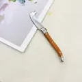 Klappbares Kaesemesser mit Holzmaserung Griff Edelstahl tragbares Taschenmesser Besteck - 1 Stück Beschichtete Holzmaserung Phönix-Schwanz Käsemesser
