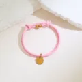 Pink braided leather cord bracelet with gold round tag pendant minimalist jewelry accessory - Pink Cord Rose Gold Tone