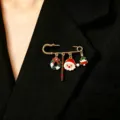 Detailed view of Christmas holiday brooch with Santa Claus, tree, and wreath charms. - Santa Claus Tree Wreath Style (2772) / Gold