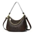 Detail view of the brown textured leather shoulder bag with elegant gold chain and hardware decoration. - Dark Brown