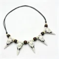 Resin crow skull wooden bead necklace detail view, gothic tribal adjustable choker. - White