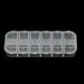 Clear plastic 12-grid storage box with numbered flip lids, perfect for jewelry beads and small parts. - 12 Grids Compartment Box 1 Pc (13x5x1.5cm)