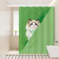 Detail view of the cute cat shower curtain with waterproof fabric in modern bright bathroom. - Single Curtain (80x180cm) with Rings & Tieback / Green Ragdoll Cat 02