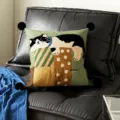 Detail view of a cute cartoon cat cushion pillow with pom-pom corners for living room sofa. - Ruanmian Black Pom-pom