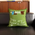 Detailed view of a vintage dachshund green throw pillow with cute graphic print on sofa. - Green Plaid Dachshund