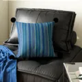 Blue striped throw pillow with black pom poms for living room sofa cushion decor detail - Deep Sea Stripe Black Pom-pom