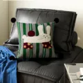 Green decorative throw pillow featuring cute cartoon rabbit and apple design for sofa. - Rabbit Fruit Black Pom-pom