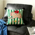 Green striped decorative cushion with cute elephant cartoon and black pom-poms detail. - Elephant Fruit Black Pom-pom