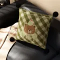Green plaid throw pillow with cute cartoon bear embroidery, fluffy black pom-poms, soft cushion core. - Green Brown Bear Black Pom Pom