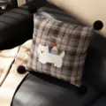 British style plaid throw pillow with cute cartoon dog embroidery and corner pom-poms for sofa. - Little House Dog Black Pom Pom