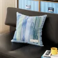 Blue and green striped throw pillow detail view, cozy home decor for sofa and living room. - Blue Plaid