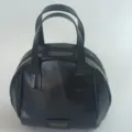 Schwarze PU Leder Kuppel Handtasche für Damen, große Kapazität tragbare Reise Kosmetiktasche. - Schwarz