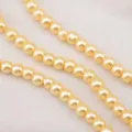 Glossy glass imitation pearl beads, golden round loose beads for DIY jewelry making necklaces. - Yellow / 1 Strand of Approx 150 Pcs (6mm)
