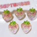 Cute resin strawberry charms with glitter and smiley face for DIY craft, jewelry and shoe decor. - Champagne Strawberry