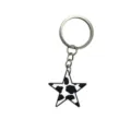 Llavero de estrella con estampado de vaca en blanco y negro, colgante de PVC. - Estrella Estampado Vaca Negro Blanco