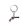 Llavero de pistola revólver vaquero del oeste de PVC blando, lindo colgante para bolso y accesorio. - Revólver