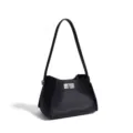 Black leather shoulder bag for women, stylish bucket handbag with top handle and metal lock. - Black
