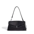 Bolso de hombro de cuero negro para mujer, elegante bolso cruzado con cierre metálico. - Negro