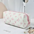 Quilted canvas cosmetic bag with cute pink bow print, large capacity pencil case for daily use. - Butterfly Zipper