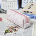 Pink striped quilted pencil case with cute bow print, large capacity makeup pouch for daily use. - Striped Butterfly