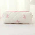Cute quilted pencil case with pink bows, large capacity fabric makeup and stationery storage. - White Background Pink Butterfly