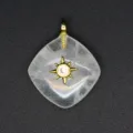 Diamond-shaped natural crystal pendant with gold starburst zircon charm necklace item. - White Crystal
