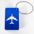 Étiquette à bagages en aluminium bleu avec découpe d'avion et câble en acier pour valise. - Bleu