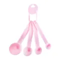 Detailed view of pink plastic measuring spoons set, highlighting clear scale markings. - Pink 4-Piece Set / Colorful