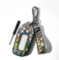 Detailed view of Chinese style zodiac snake car key case and strap with metal hardware. - Length 16.5cm Width 4.5cm / Lucky Jade Snake