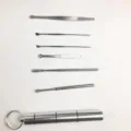 Detail shot showing stainless steel ear pick tools and portable metal storage case neatly. - Aluminum Bottle Set Style A / Silver