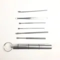 Stainless steel ear pick set 6 pieces earwax removal tool portable keychain metal container detail view - Aluminum Bottle Set Style B / Silver