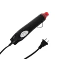 Détail du pistolet à air chaud portable avec corps noir et couvercle de buse rouge. - Noir et Rouge