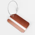 Rose gold aluminum metal luggage tag featuring secure steel wire loop and name card slot. - Cut Corner Brown