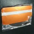 Aluminum metal luggage tag with steel wire loop, bright orange ID bag label for travel. - Cut Corner Orange