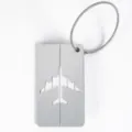Durable aluminum alloy luggage tag with metal wire loop and hollow airplane design for travel bags. - Silver