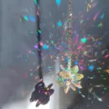 Crystal suncatcher prism hanging pendant with sparkling rainbow light effects for home decor. - AB Iridescent Snowflake