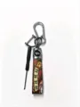 Chinese style car keychain with metal hook, mini screwdriver and decorative strap detail. - Monkey Sealing Official Post