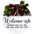 Round wooden door sign with eucalyptus greenery and buffalo plaid bow for home wall decor - Humorous Welcome-ish Style (MPH6002)