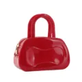 Red PVC jelly Boston handbag featuring double top handles, glossy finish and gold zipper. - Red