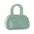 Grüne PVC Jelly Boston Tasche Detailansicht, glänzende Textur, Doppelgriff Design minimalistisch. - Grün