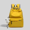 Yellow college style canvas backpack with cute plush pendant daily casual daypack - With Charm / Yellow
